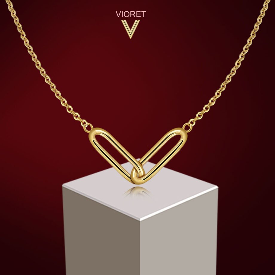 Colgante Oro Dúo sobre pedestal blanco diseñado por Vioret Joyas ®