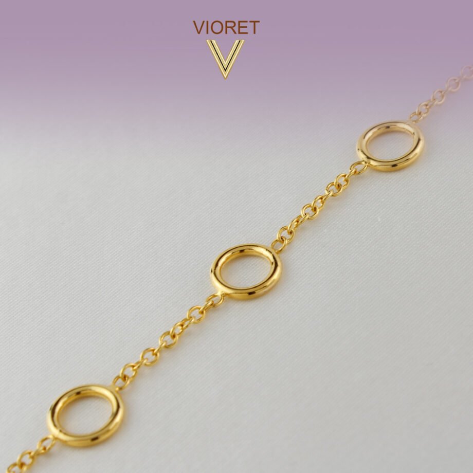 Pulsera Oro Adara Formada por aros y acabada en oro de 18 quilates