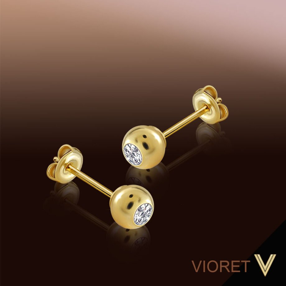 Pendientes Oro Silvia con circonitas engastadas a mano y acabados en oro